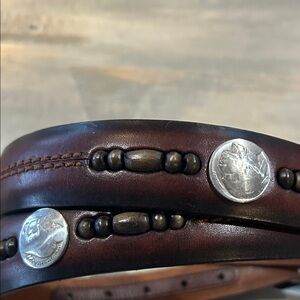 Leather belt with Indian head /silver accent.. 45 inches end to end . Size 38